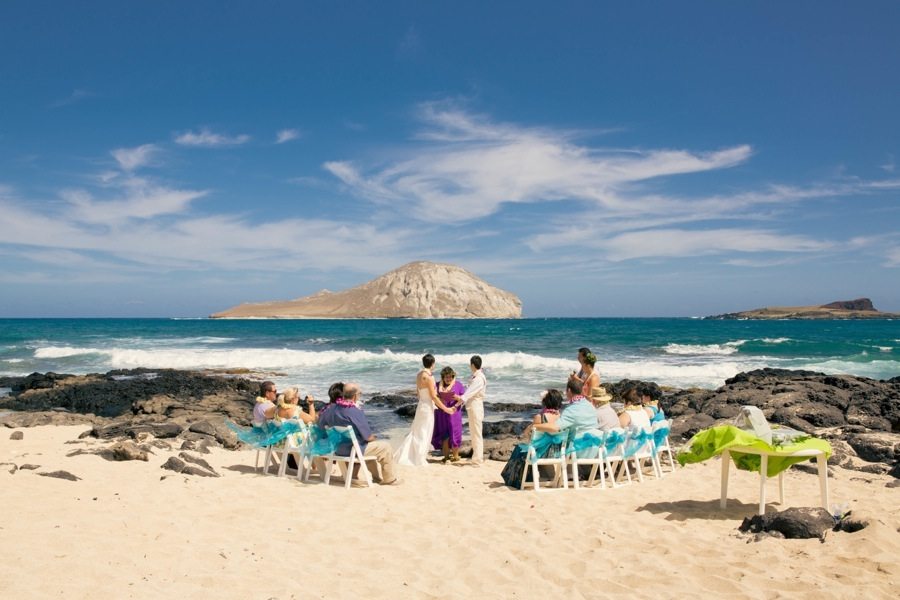 destination hawaii wedding, beach, sand, oahu, couple, bride, groom, lava rock, rabbit island