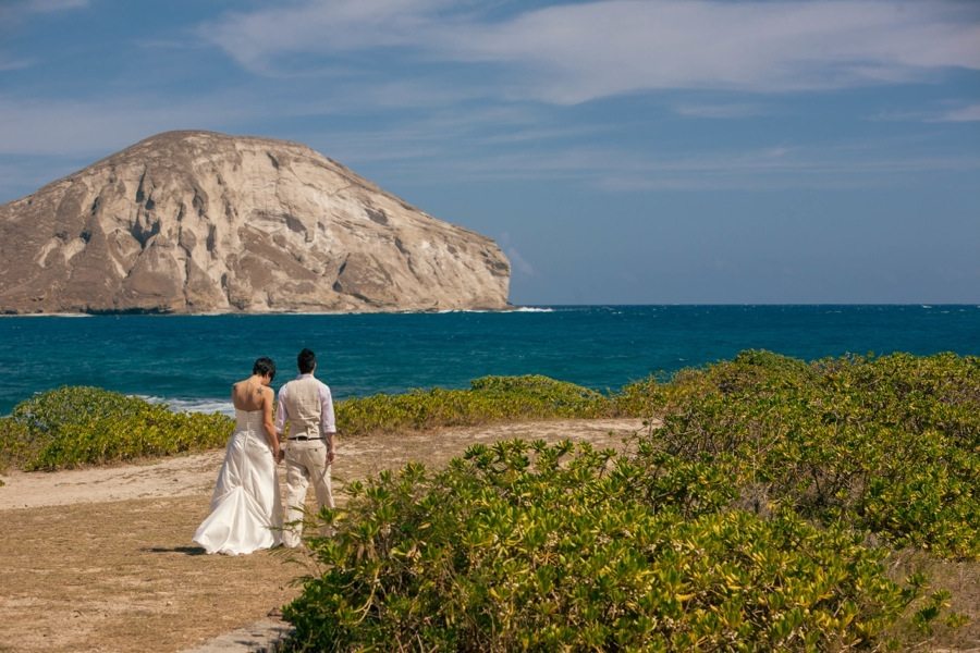 destination hawaii wedding, beach, sand, oahu, couple, bride, groom, lava rock, rabbit island