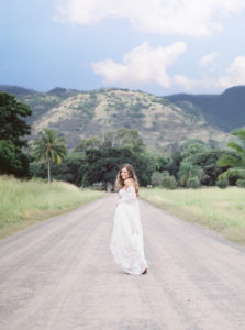 Bride running in road, dillingham ranch oahu hawaii