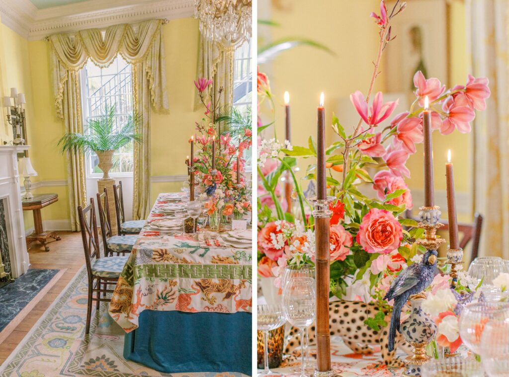 Wedding Venue Lowndes Grove in Charleston. Inside the Yellow room with jungle themed wedding reception. Centerpiece with hues of pinks, hot pinks and magentas fuschias. Bespoke table linen. Brown and silver candle sticks with blue parrots and a tiger. 