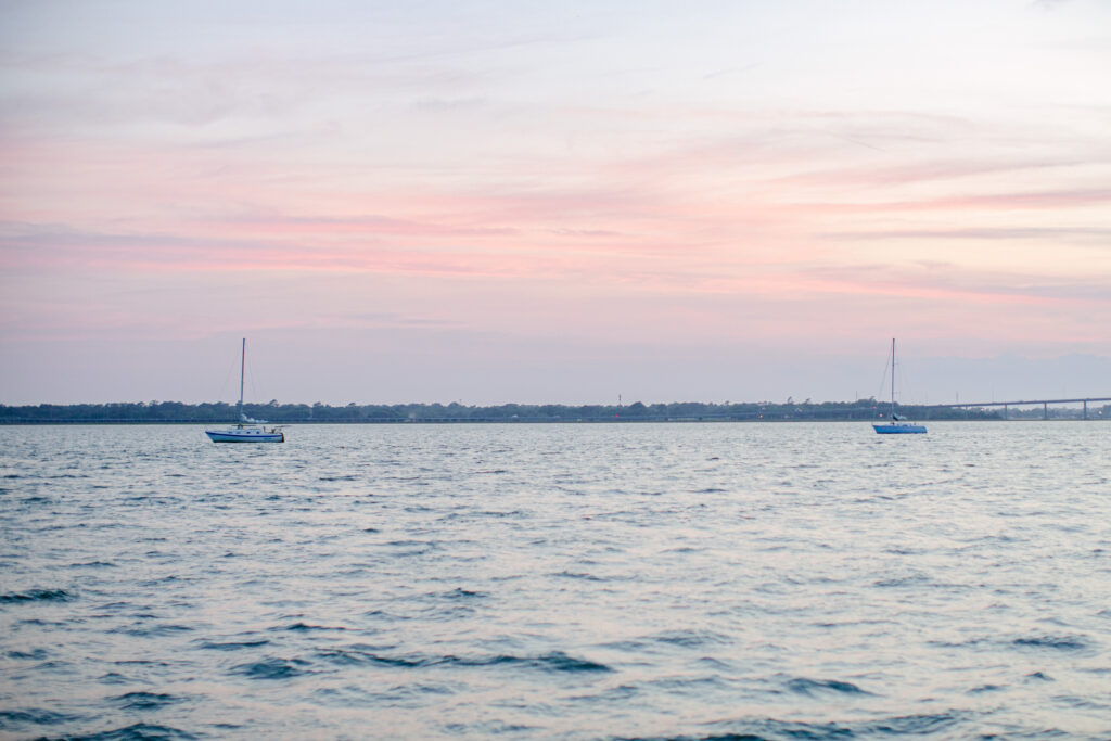 Sunset in pastel hues of blues and pinks along the Ashley River in Charleston, SC