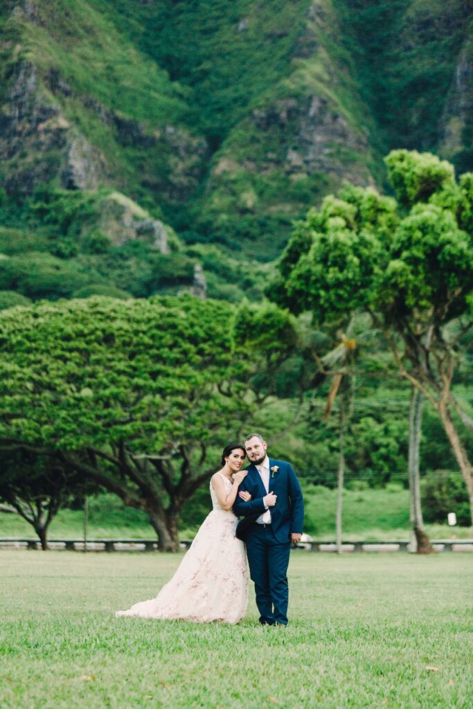 couple in front of the koolua mountains hawaii elopement