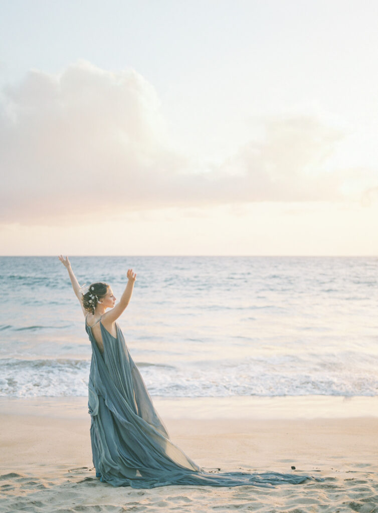 Bride on a beach at sunset in wailea maui