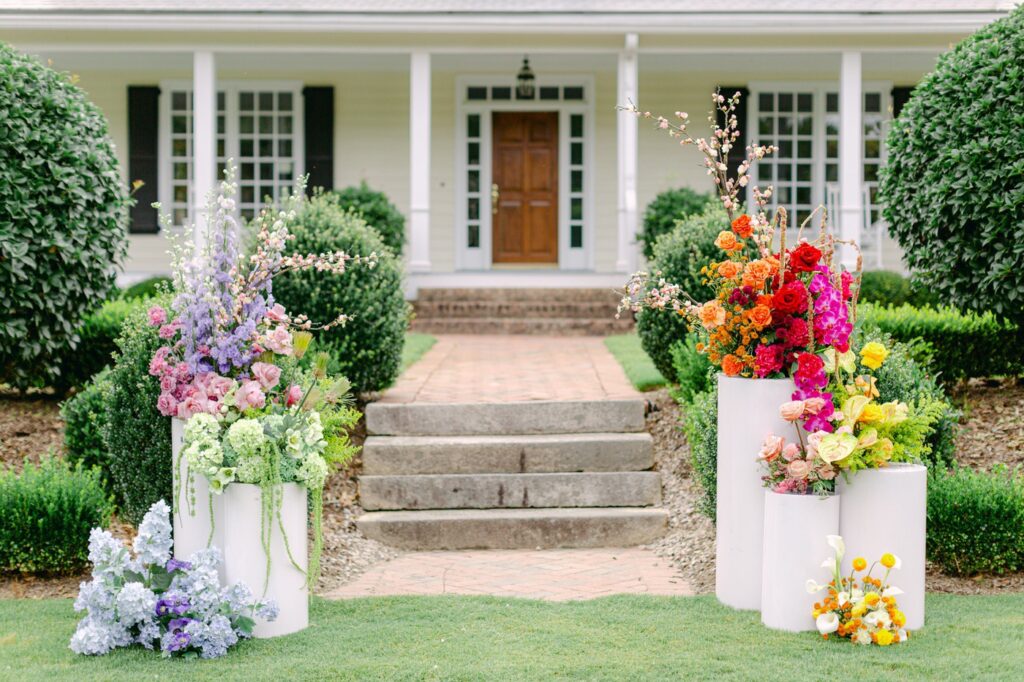 A Joyful Summer Wedding at a Private Estate in Raleigh, NC 2 Wedding Ceremony in bold colors of pink, tangerine, yellows and blues at a North Carolina wedding venue