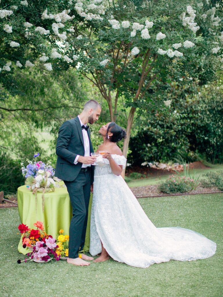 A Joyful Summer Wedding at a Private Estate in Raleigh, NC 24 Champagne toast at an outdoor wedding in Chapel Hill North Carolina