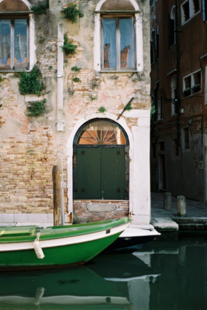 Film Photography Boat in the Canal in Venice, Italy