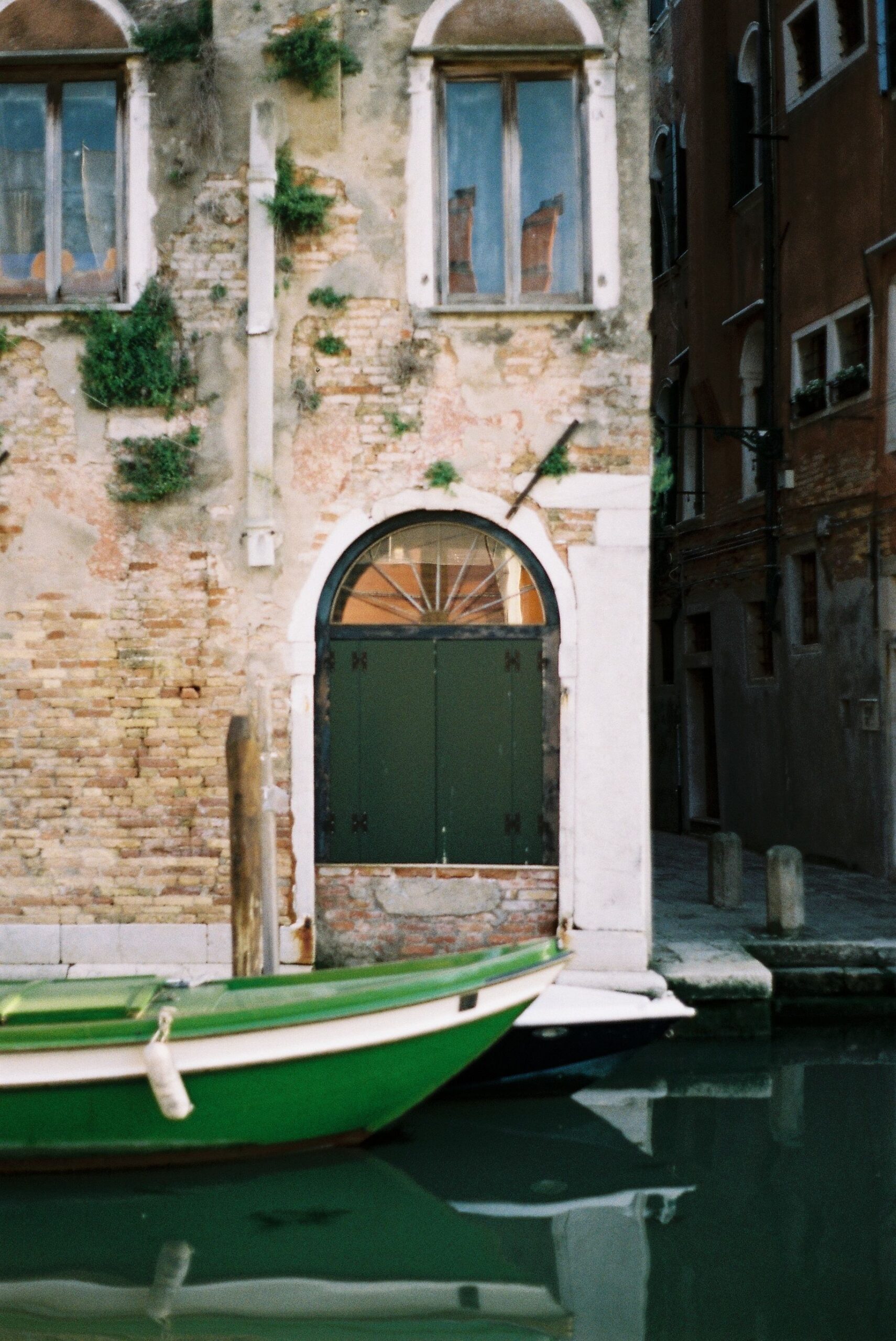 Film Photography Boat in the Canal in Venice, Italy