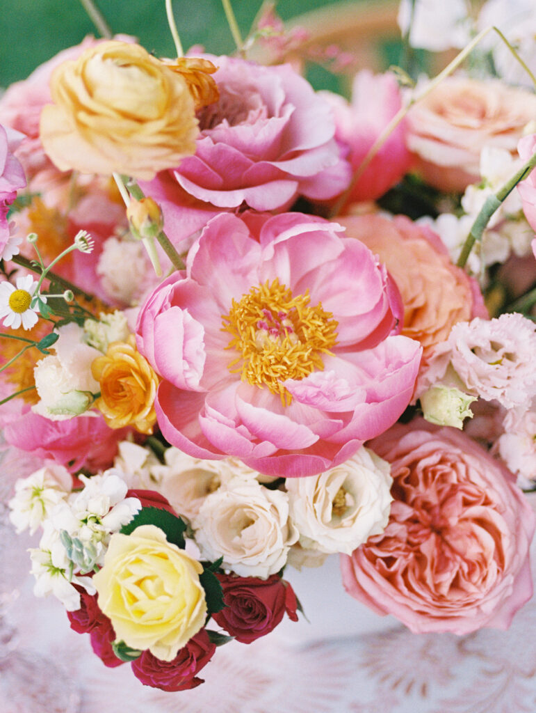 Vibrant tropical wedding centerpiece  with pink peonies, reception wedding flowers hawaii