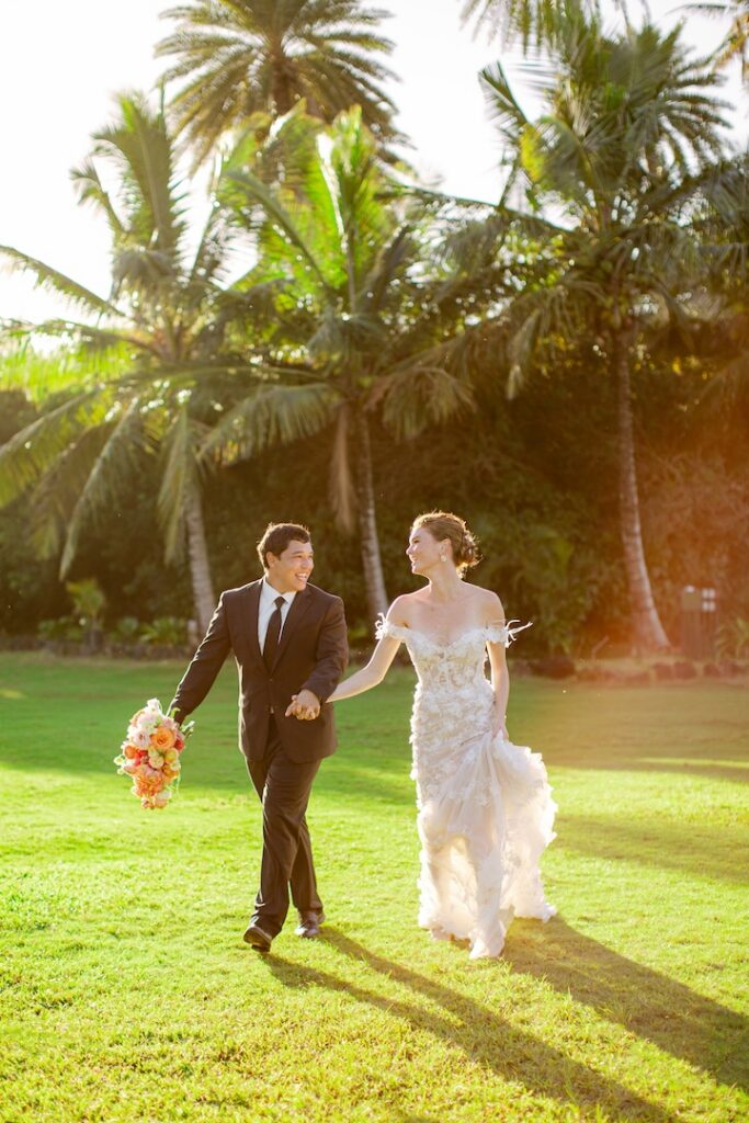 couple walking Loulu Palm estate wedding north shore hawaii