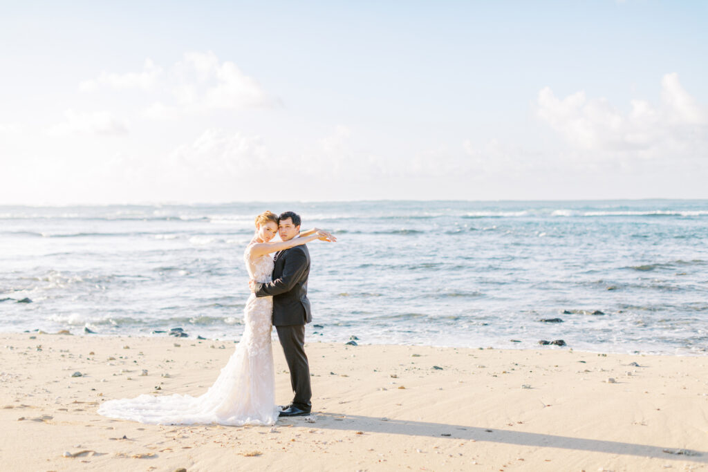 Loulu Palm Estate Wedding North Shore Oahu Hawaii, couple embracing on the beach hawaii