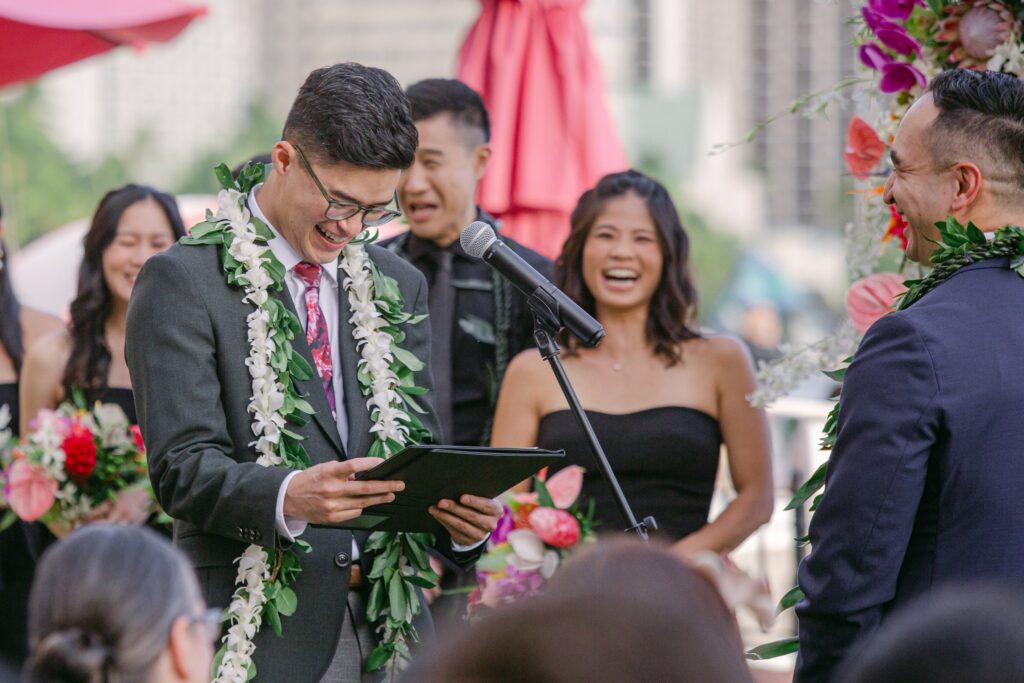 grooms exchanging vows royal hawaiian hotel